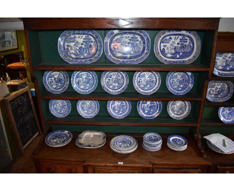 Fifty-two pieces of 19th century and later blue and white ironstone in the 'Willow' and 'Italian' pattern, including meat pla