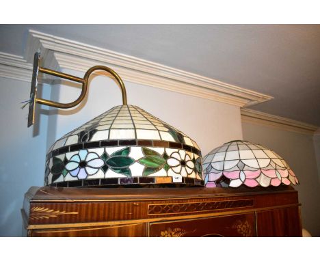 A large and impressive leaded glazed light shade with floral decoration, diameter 60cm, two smaller examples and a green enam