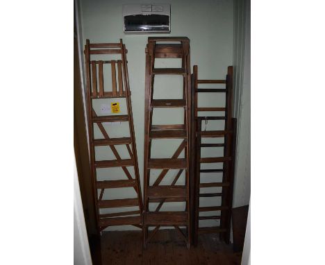Three vintage pine ladders, together with two vintage pine folding ladders (5).