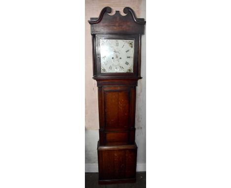 An 18th century oak cased eight day longcase clock, the painted dial set with Arabic and Roman numerals, with two subsidiary 