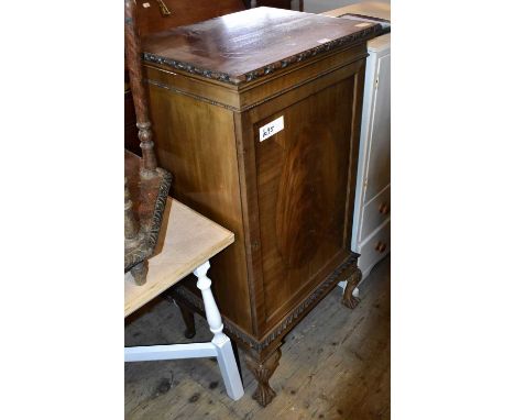 A Chippendale style mahogany side cabinet on ball and claw feet, height 116cm.