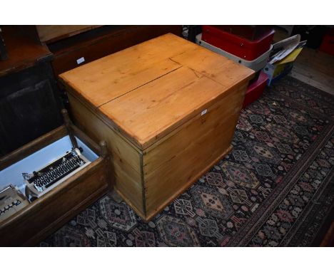 A large pine bedding chest on plinth base, width 83cm, depth approx 69cm, height 67cm.