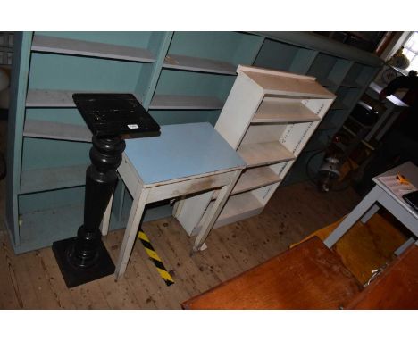 A Victorian ebonised jardinière stand on plinth base, a green painted table with folding mangel and a painted bookcase (3).