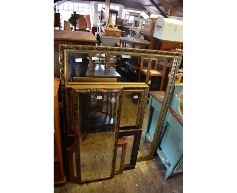 A white painted dome topped travelling trunk, together with five decorative mirrors, to include a gilt framed example with be