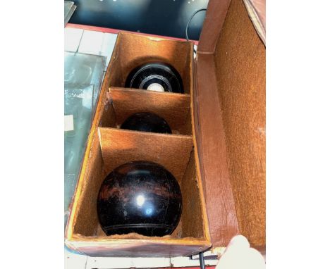 A set of bowls and jack in a leather case, R Whitty, Liverpool 