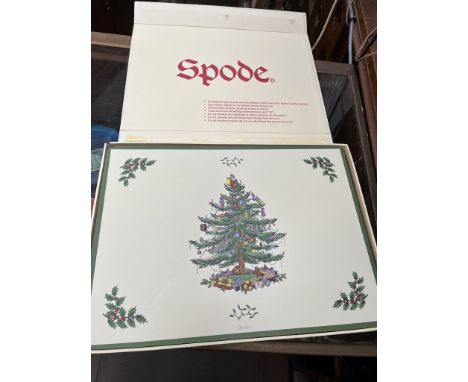 A boxed set of Spode Christmas mats. 