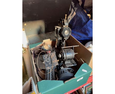 A circa 1920s antique Baby projector British Pats, made in France, for 9.5mm film with accessories. - Not tested - AF/AS. 