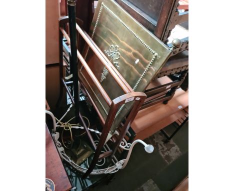 Various items of furniture; a metal and glass coffee table, a metal and glass demi-lune table, an Edwardian towel rail, a bra