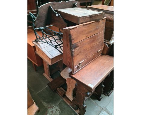 Two child's school desks, an oak lectern, an oak wall hangining shelf and a wooden box containing number cards. 