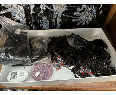 A box of vintage beadwork. 