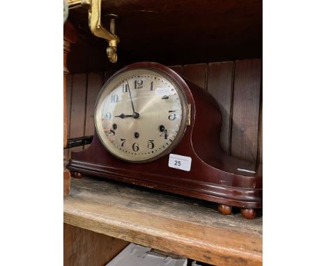 An early 20th century mahogany cased mantle clock. 