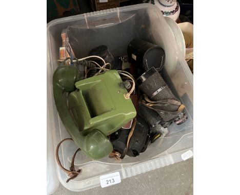 A box of cameras and related items, binoculars, lenses, etc and a vintage telephone. 