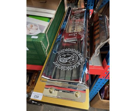 A large shop display M. Hohner harmonica. 