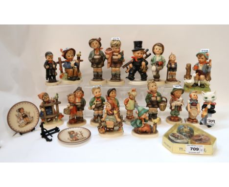 Eighteen Hummel figures, two small plates, pill boxes and another figure Condition Report: Available upon request