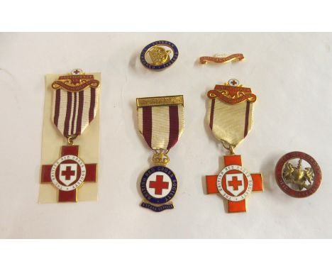 Three enamel British Red Cross nursing medals to J.T. Waddell with box and collection of other enamel medals Condition Report