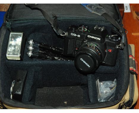 A Chinon camera and accessories Condition Report: Available upon request