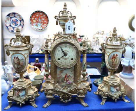 A French enamel clock garniture with printed decoration of couples Condition Report: Available upon request