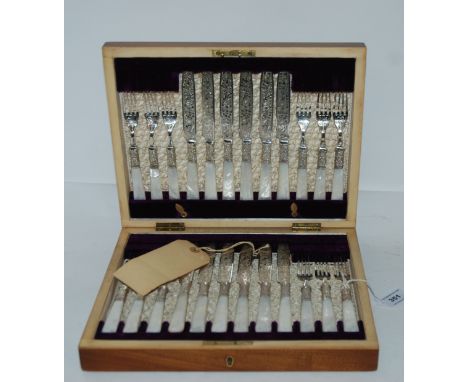 A cased set of twenty four EP and mother of pearl desert cutlery Condition Report: Available upon request