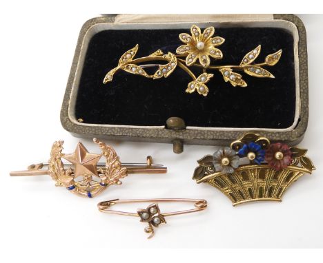 A bright yellow metal flower brooch weight 3.6gms, two 9ct gold brooches weight combined 3.6gms, and a silver gilt basket of 