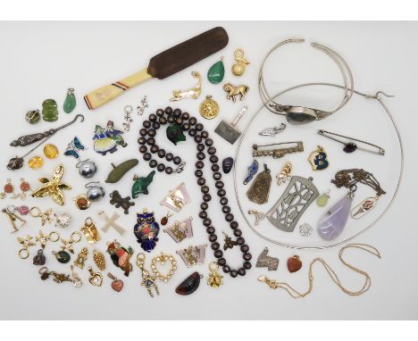 A string of black pearls with a silver clasp, white metal moss agate bangle and other items Condition Report: Not available f