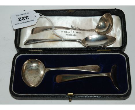 A lot comprising a cased silver spoon and pusher, a silver teaspoon and a silver sauce ladle, 94gms Condition Report: Availab