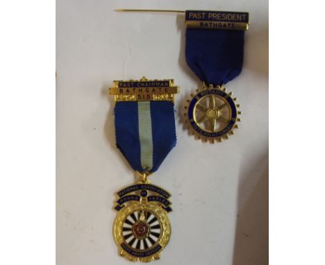 A yellow-metal and enamel Part President Rotary International lapel badge, similar Round Table example and a collection of en