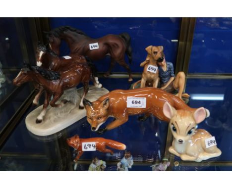 A Wade Blowup Bambi, Sylvac fox, Beswick fox and horse, Royal Doulton group Buddies and another horse group Condition Report: