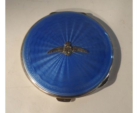 A silver and blue enamel compact with RAF badge, 7.8cm diameter Condition Report: Available upon request