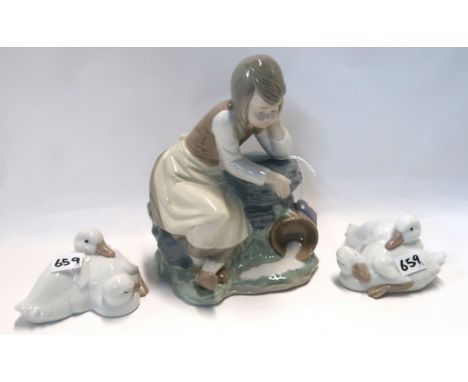 A Nao figure of a girl and two Nao figures of geese Condition Report: Available upon request