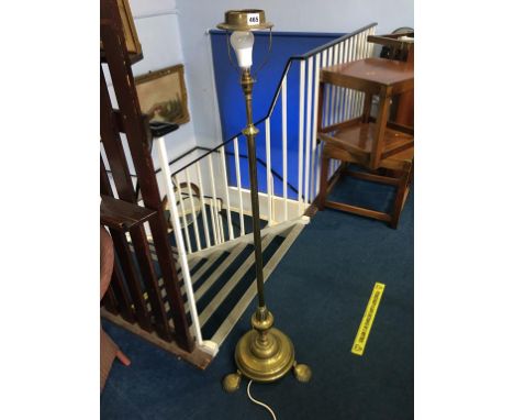 A brass telescopic standard lamp