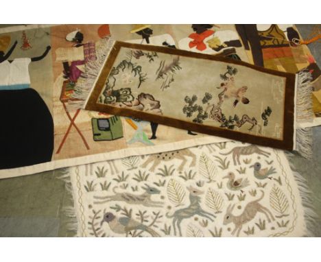 A small Chinese part silk rug, a woollen rug and a hanging tapestry