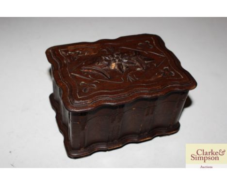 A Black Forest type musical trinket box 