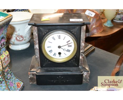 A Victorian marble mantel clock