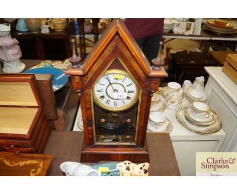 A Gothic style two hole mantel clock 