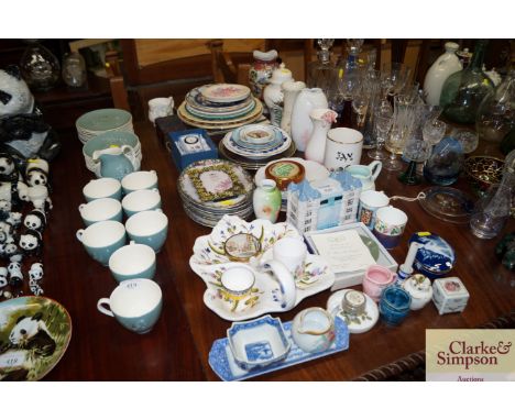 A collection of various decorative porcelain to include vases, cabinet plates, a clock etc. 
