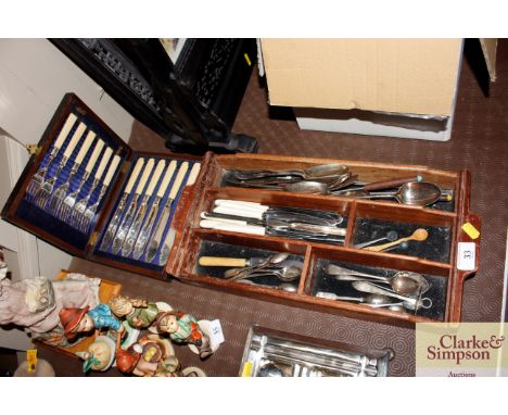 A cased set of six each plated fish knives and forks; and a wooden cutlery tray and contents of various plated cutlery