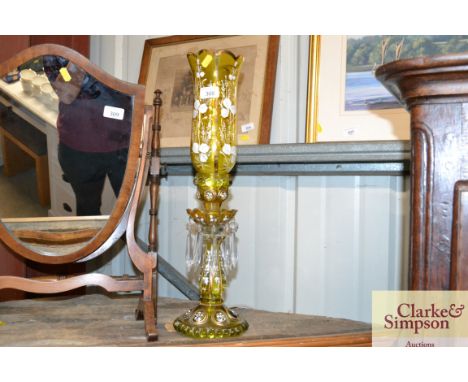 A green tinted and enamel decorated lustre hung table lamp