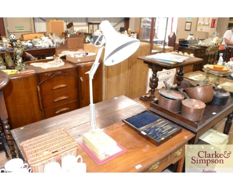 An angle poise type lamp