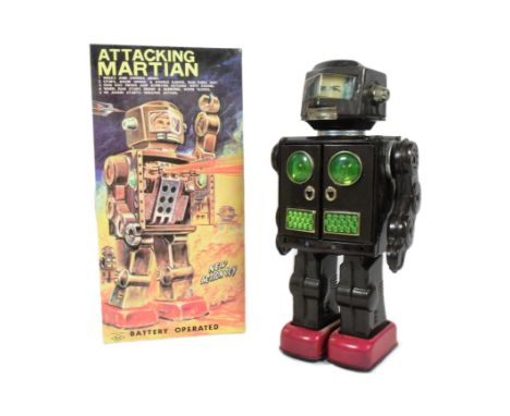 Tinplate Toys - a vintage Japanese Attacking Martian robot. Tested and is not in working condition, apart from lights inside 