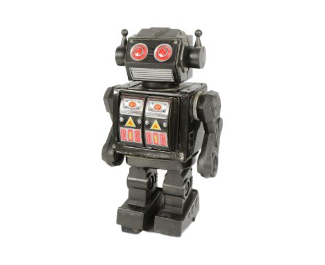 Tinplate Toys - a vintage Japanese Rotate-O-Matic Super Robot. Featuring walking action, rotating torso, shooting and blinkin