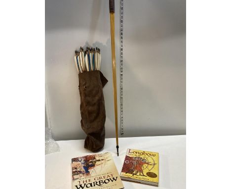 A vintage Longbow with selection of arrows and two longbow related hardback books, shipping unavailable 