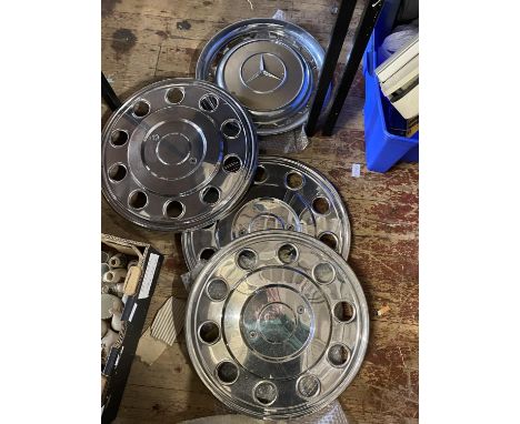 A selection of assorted vintage Chrome hub caps 