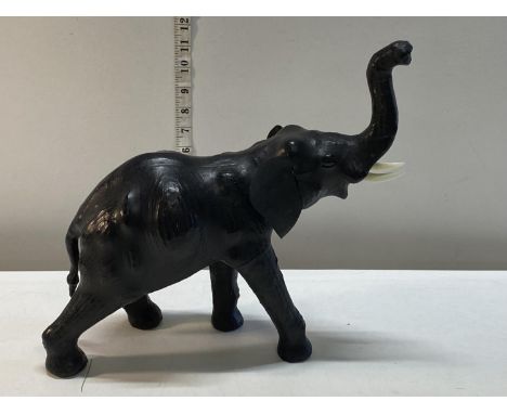 A vintage leather elephant 35cm 