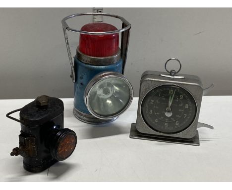 Two vintage torches and a vintage timing clock 