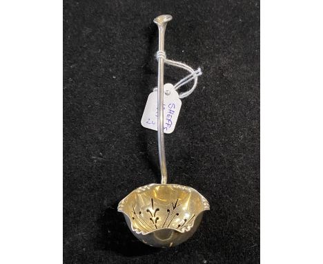 A hallmarked for Sheffield 1911 silver straining ladle with gilt bowl 24g 