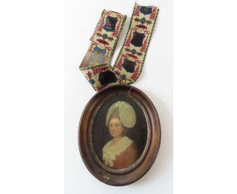 19th century continental school, portrait of a female, in an oval frame, oil on board, 14cm x 12cm 