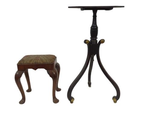 A small Queen Ann style stool with drop in seat together with a tilt top wine table the top painted with book and manuscript 