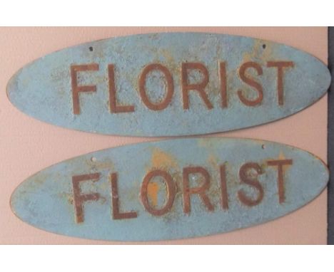 Pair of vintage oval metal FLORIST signsBoth signs are 75 cm long 