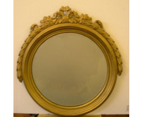 Vintage circular mirror in the French empire style gesso edgingThe mirror measures 30 cm in diameter 