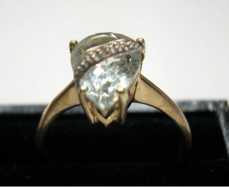 9ct yellow gold pear cut, large light blue stone (possibly tourmaline)Approx 2.5 grams gross                 size S 